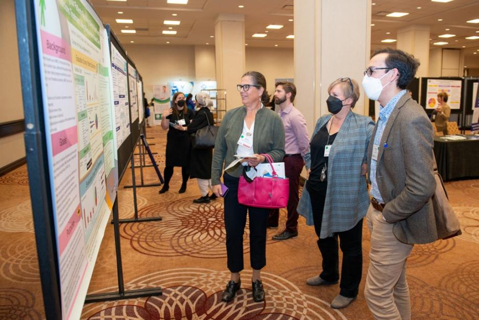 2022 attendees with posters 2022 attendees with posters
