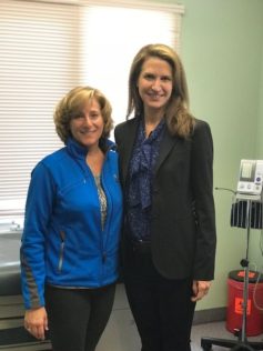 AFHTO Vice President Beth Cowper-Fung of Georgina NPLC speaking to PC candidate Caroline Mulroney about the importance of team-based care